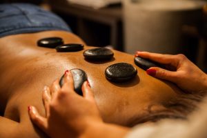Why Should You Get A Hot Stone Massage What Are the Benefits